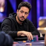 Illustration of Adrian Mateos playing at a poker tournament table, stacking chips during a high-stakes event.