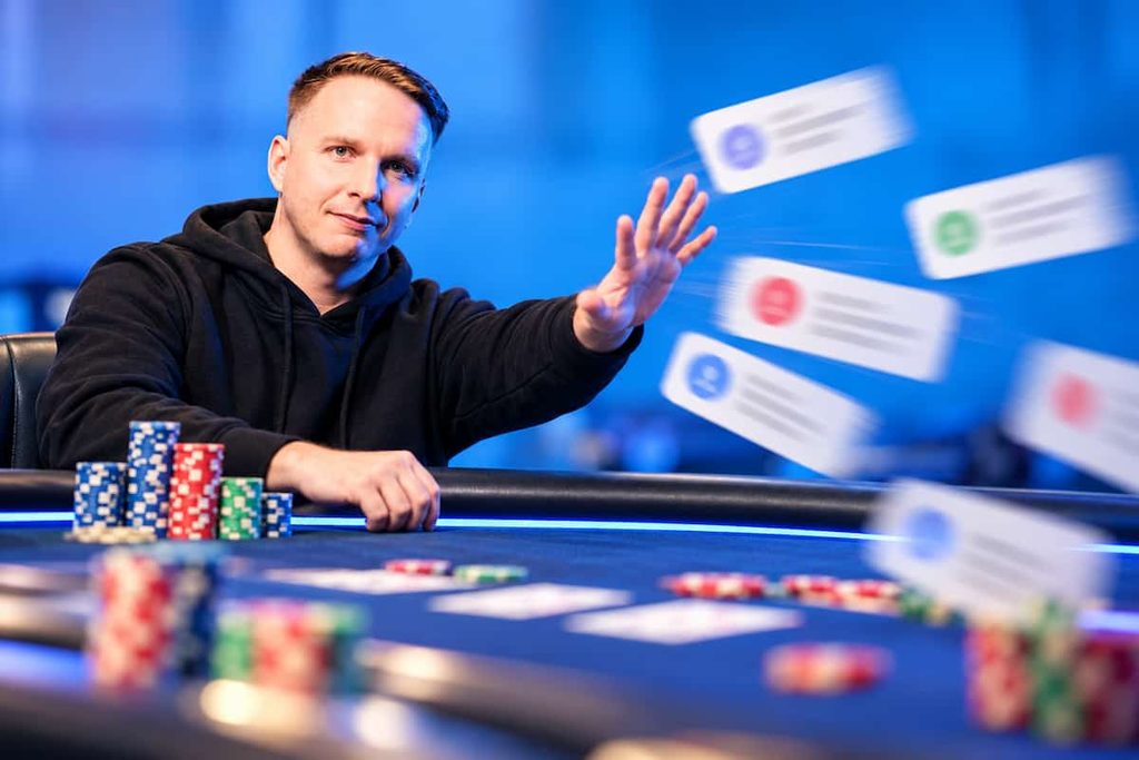 Ben Rolle brushes aside scam private-game messages at a poker table.