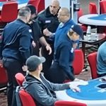 Enhanced CCTV still showing Sammy Farha confronting poker dealer Doug Caillier at Houston Social Cardroom, with security staff intervening during the October 2026 altercation.